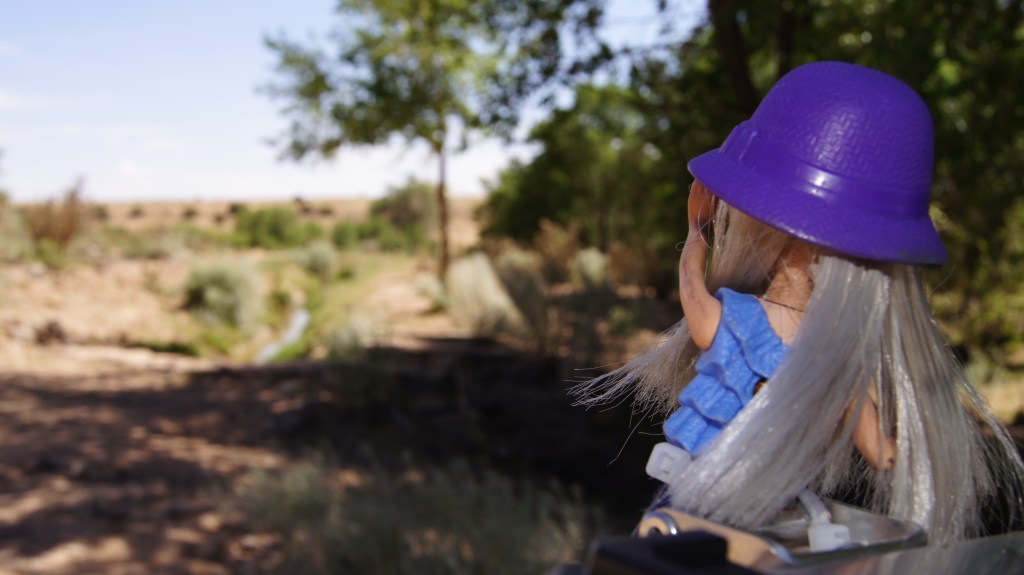 Grace wiping the sweat from her brow at the bottom of La Bajada.